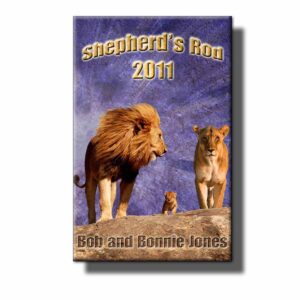 A book cover with two lions and a dog.