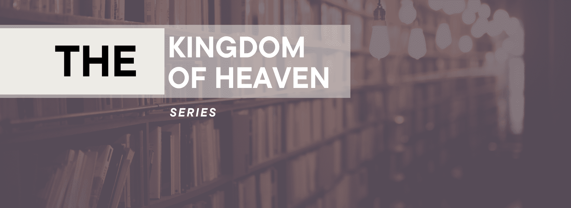 A book shelf filled with books and the words kingdom of heaven